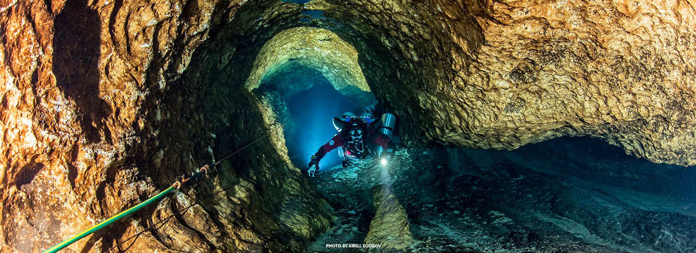 scuba diver in cave at cow springs live oak florida