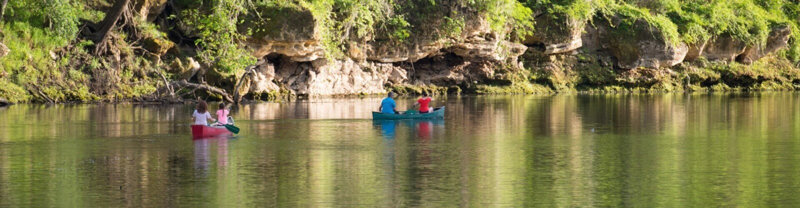 Family in canoes on the Suwannee River